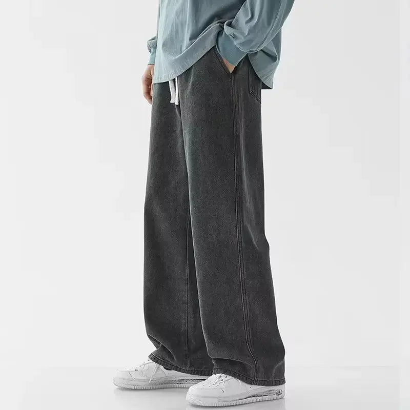 Ansoff men's loose streetwear jeans in black and light blue, featuring straight wide-leg style and Korean fashion-inspired design.