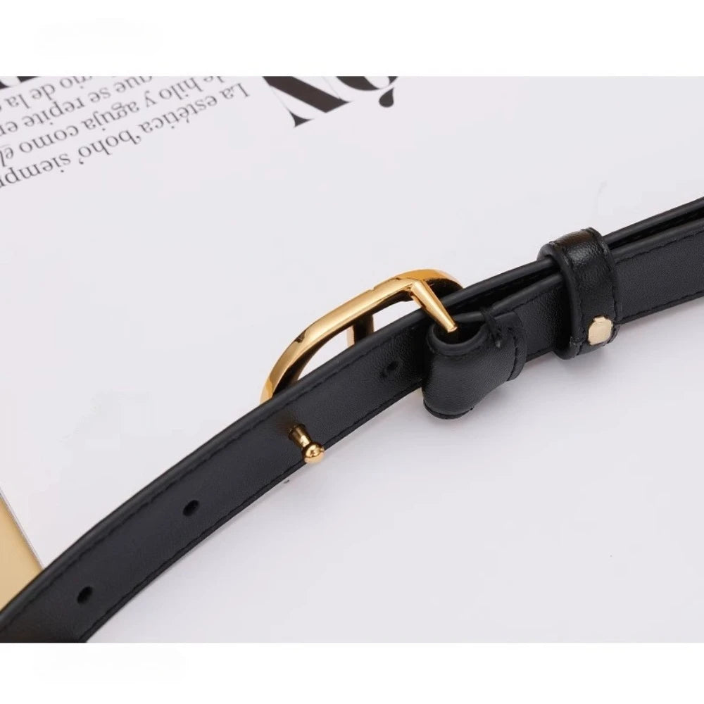 Black women's leather belt by Ansoff, stylish and versatile for jeans, featuring a simple decorative design.