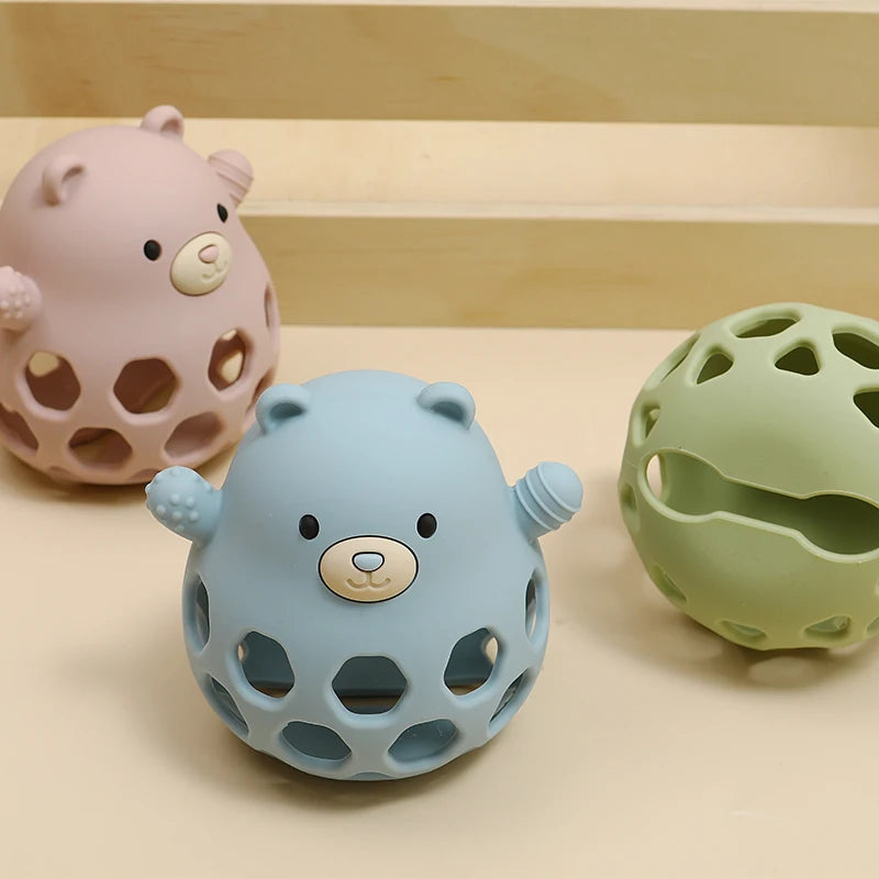 Ansoff BPA-free silicone baby teether with a cartoon bear design, perfect for newborns to chew and soothe teething discomfort.