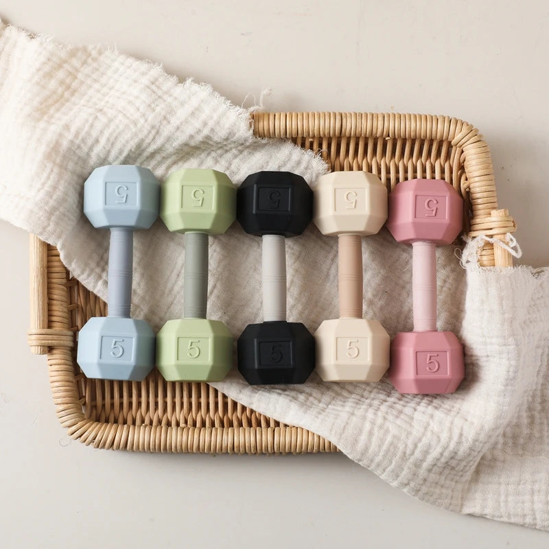 Baby silicone teething cartoon dumbbell rattle toy by Ansoff with a music bell, sensory features, suitable for crib and baby gift use