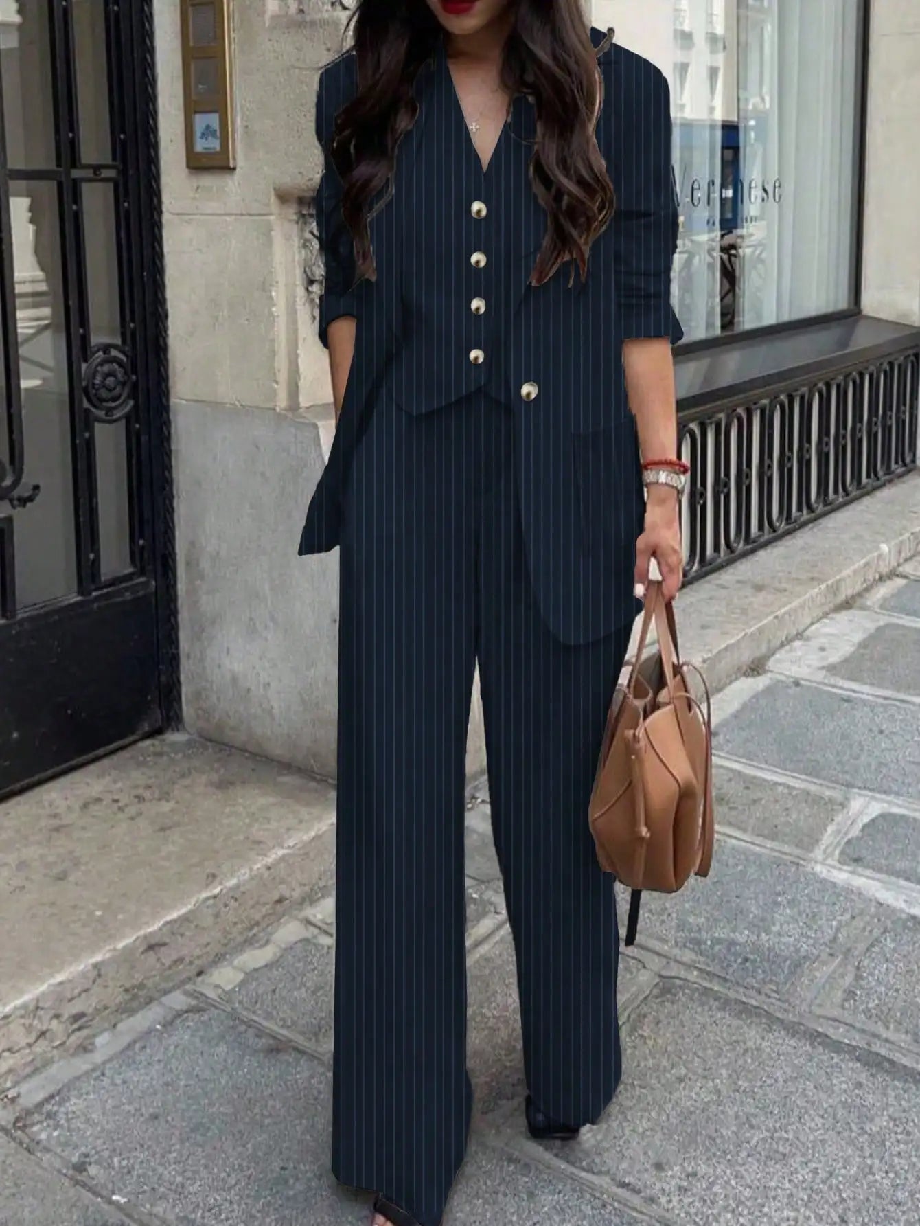 Ansoff women's striped suit set featuring a stylish, elegant design suitable for office and casual wear, shown on a model.