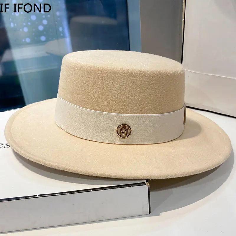 Elegant women's fedora hat by Ansoff featuring a ribbon band, stylish bowler design, perfect for weddings and dress occasions.