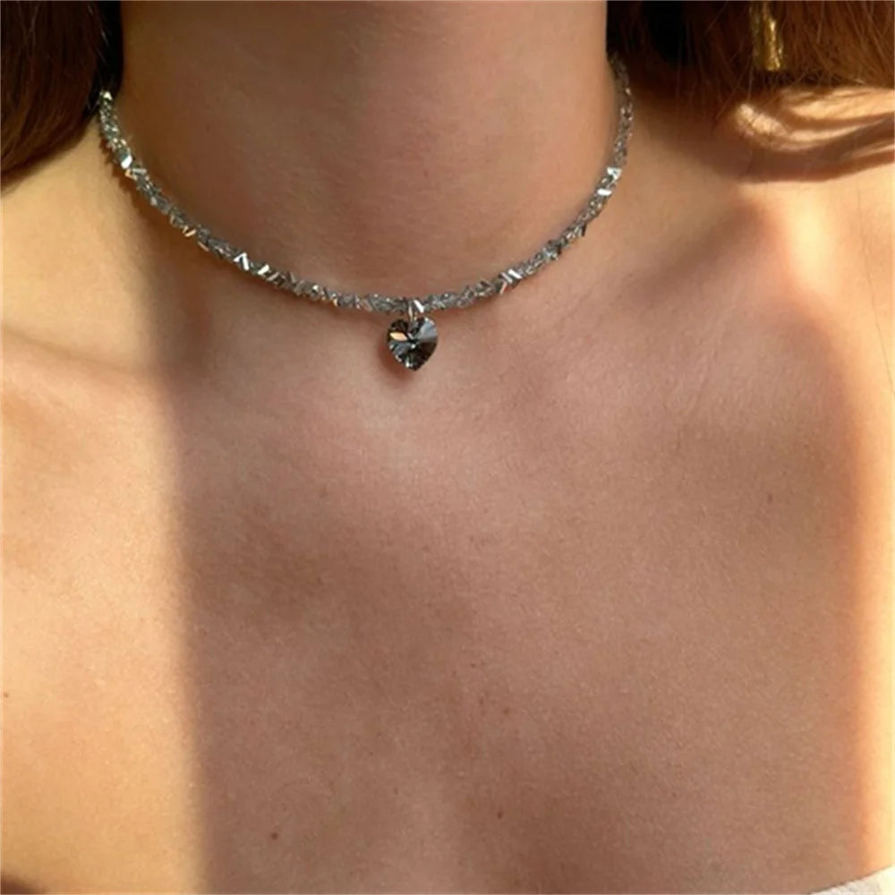 Vintage zircon heart pendant necklace for women by Ansoff, featuring a transparent crystal and boho geometric design.
