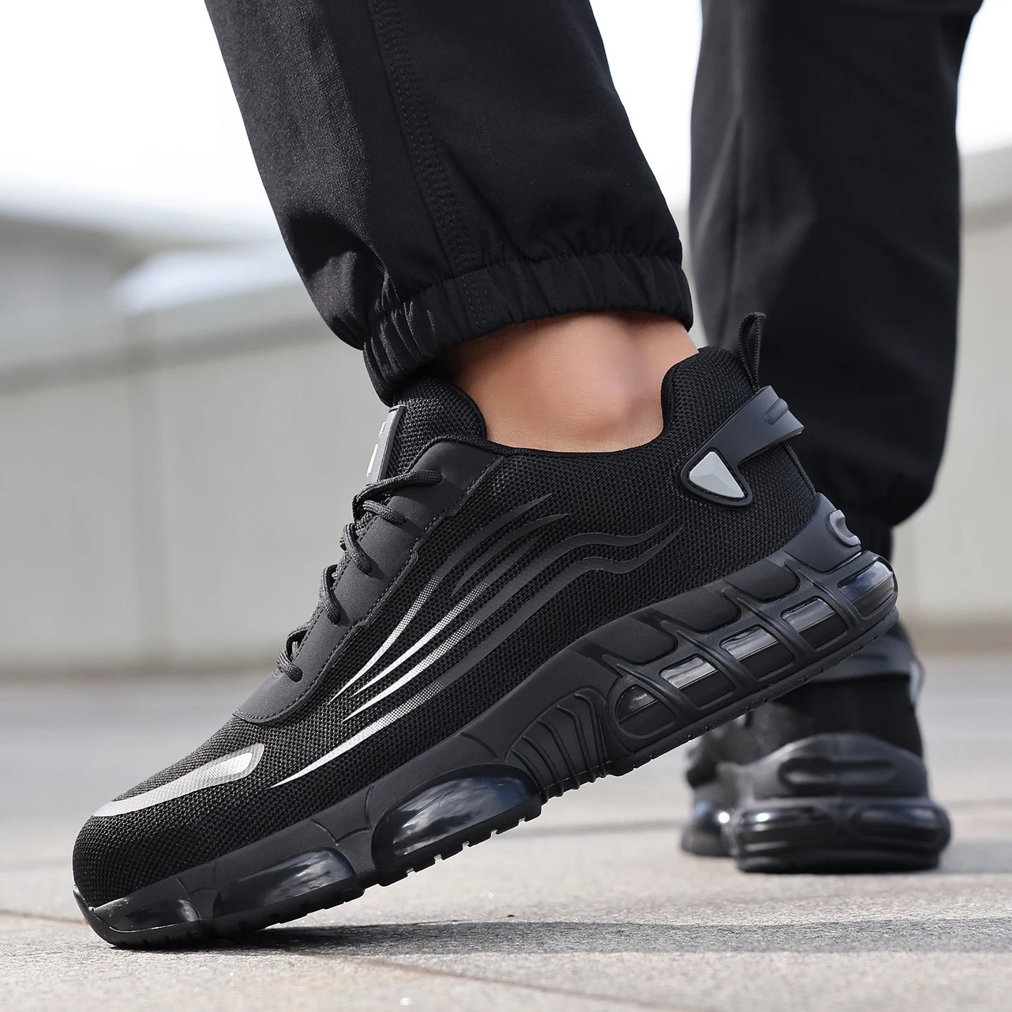 Ansoff men's work shoes with TPU sole, lightweight design, anti-shock and anti-stab features, suitable for all seasons.