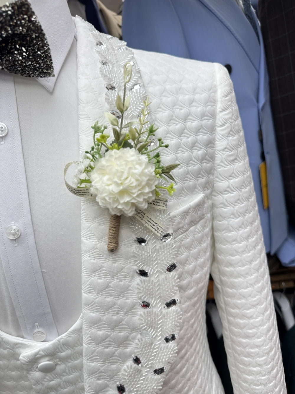 White jacquard men's tuxedo set with blazer, vest, and pants by Ansoff, ideal for weddings, formal events, or birthdays.