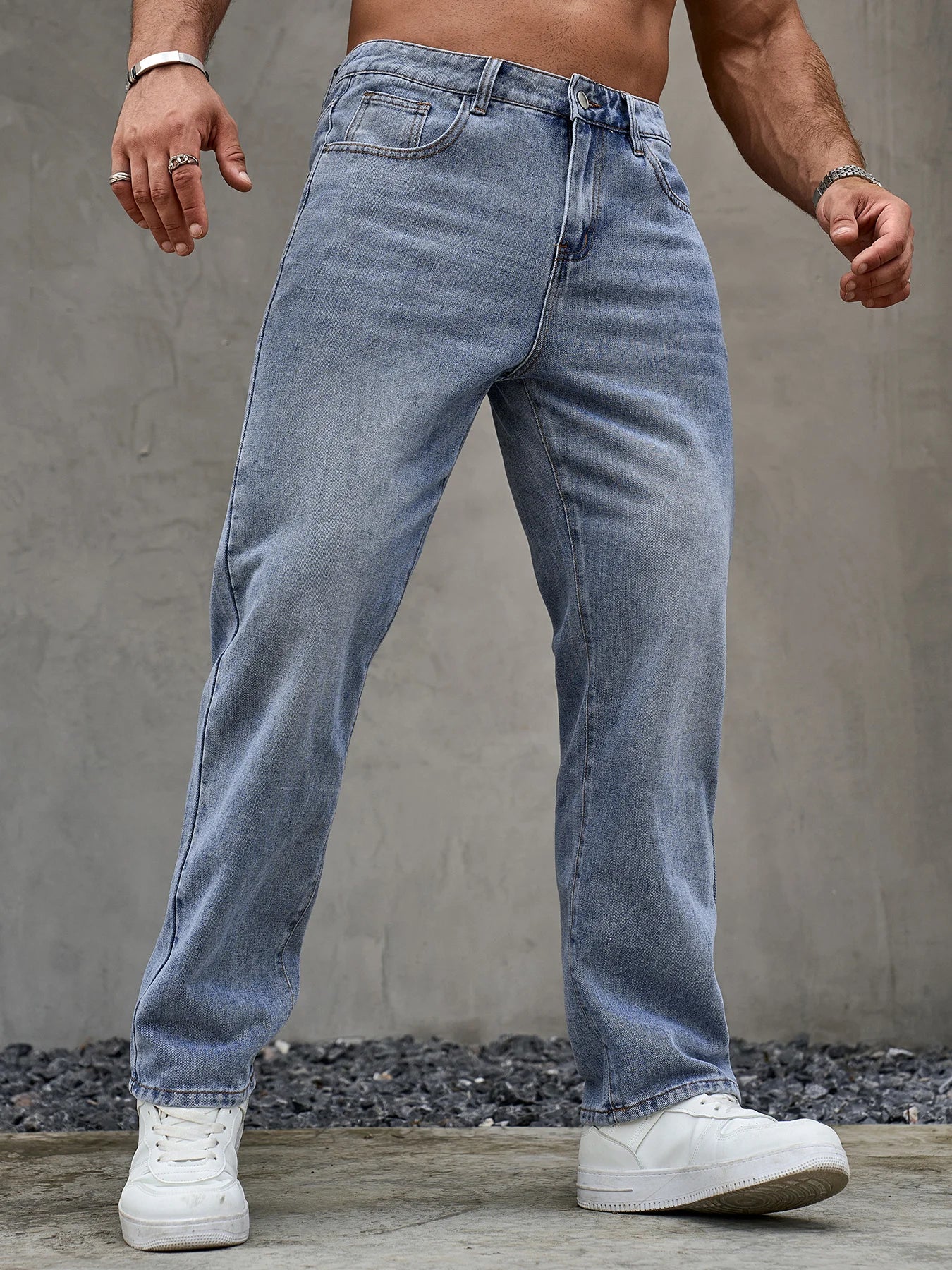 Men's loose fit casual blue denim jeans by Ansoff, straight leg style with soft, durable fabric, suitable for all-season wear.