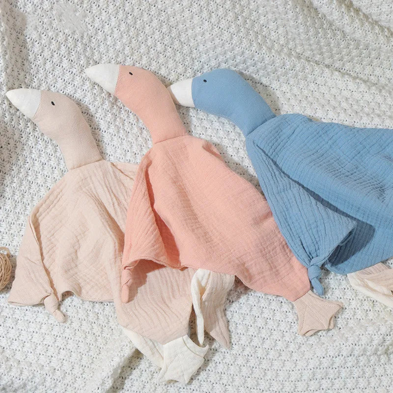 Ansoff baby security blanket made of soft cotton muslin, featuring a plush stuffed animal for newborn comfort and soothing sleep.