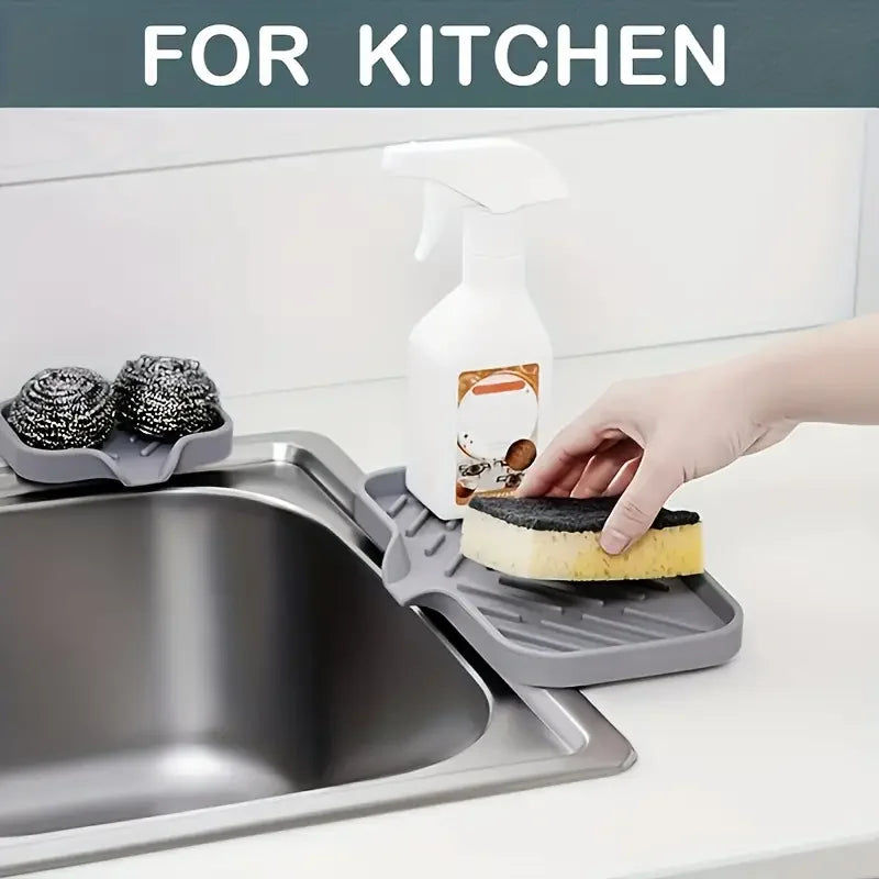 Ansoff silicone kitchen sink faucet mat with soap dispenser, sponge drain pad, and splash drying tray on countertop.