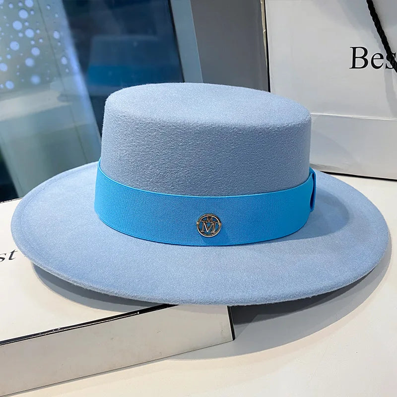 Elegant women's fedora hat by Ansoff with ribbon band, suitable for weddings and fashion, featuring a classic felt design.