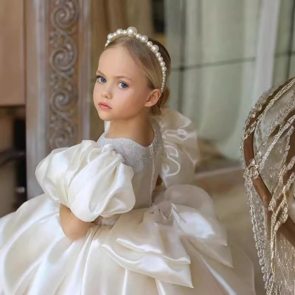 Ansoff glitter puffy tulle ball gown wedding flower girl dress with bow and O-neck, perfect for princess, communion, or prom wear.