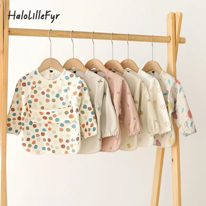 Ansoff infant feeding bibs for children, long sleeve printed art smock with waterproof fabric, pocket, ideal for boys and girls during meals.