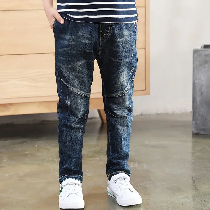 Children's denim cowboy jeans by Ansoff, size 4 to 12, featuring classic blue denim and durable sports-style design for boys.