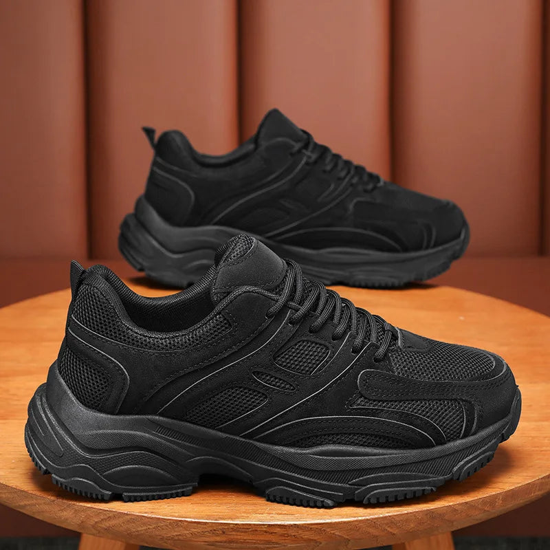 Men's black Ansoff running shoes with anti-slip soles, wear-resistant platform design, ideal for casual and outdoor sports activities.