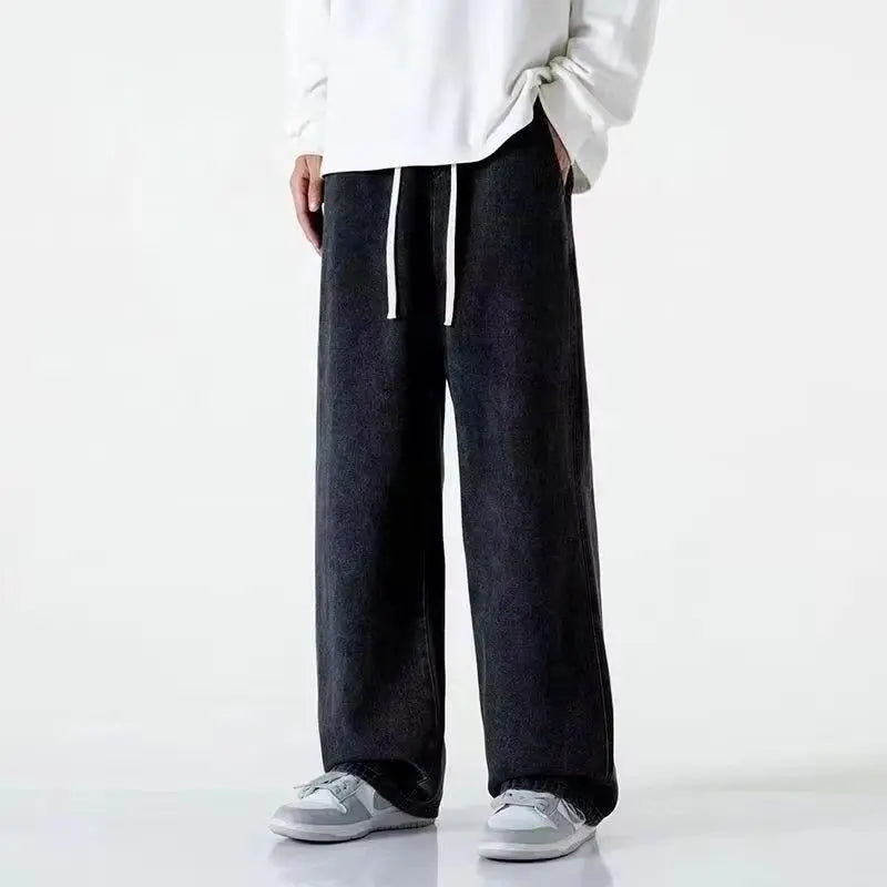 Black and light blue Korean style loose straight jeans for men, wide-leg streetwear pants by Ansoff with casual, relaxed fit.