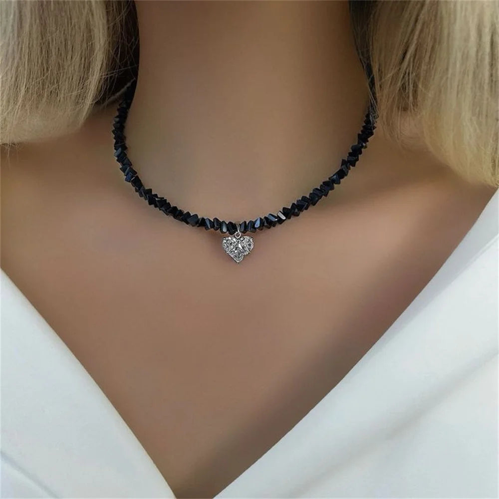 Vintage zircon heart pendant necklace for women by Ansoff, featuring a boho geometric design and transparent crystal chain jewelry.