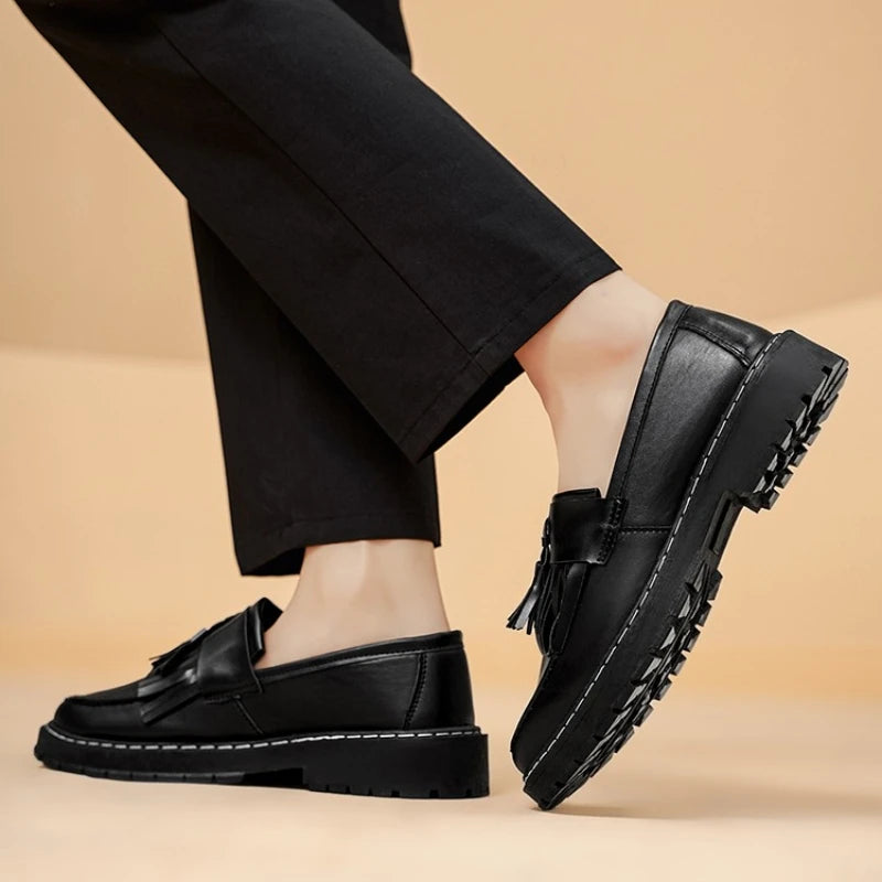 Men's leather slip-on shoes by Ansoff with round toe, shallow opening, soft high-quality formal footwear for large sizes.