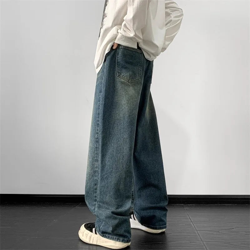 Men's wide leg denim jeans by Ansoff, loose straight fit, vintage blue denim pants for autumn streetwear style.