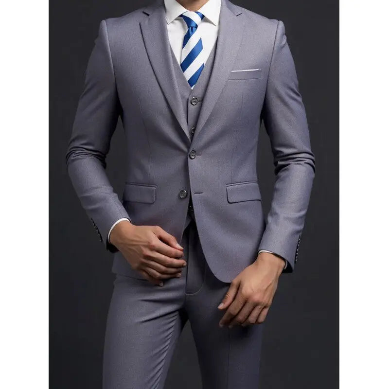 Men's stylish British-style suit by Ansoff, includes blazer, vest, and trousers for business, casual, or wedding occasions.