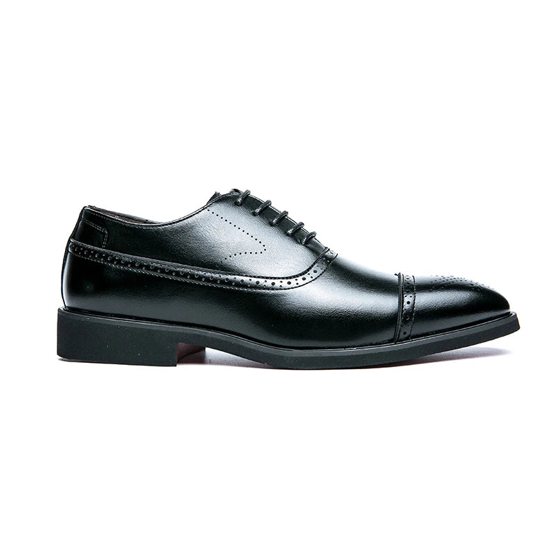 Red-soled men's Oxford shoes by Ansoff featuring carved brogue design, lace-up style, suitable for business, casual, and party occasions.