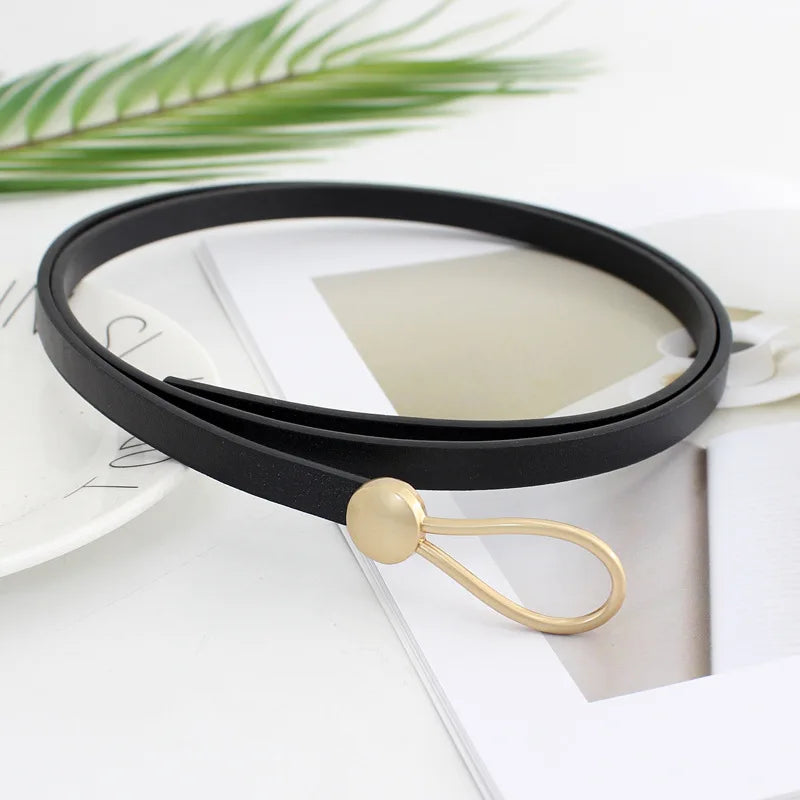 White and black leather belt for women featuring a bow knot, perfect for dresses, coats, or waistline accessories by Ansoff.