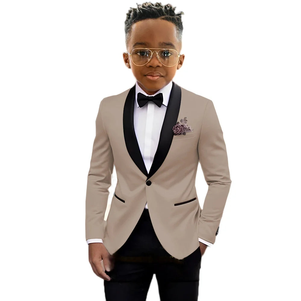 Children's slim fit tuxedo suit by Ansoff featuring a classic shawl lapel, one-button jacket, and matching trousers for formal occasions.