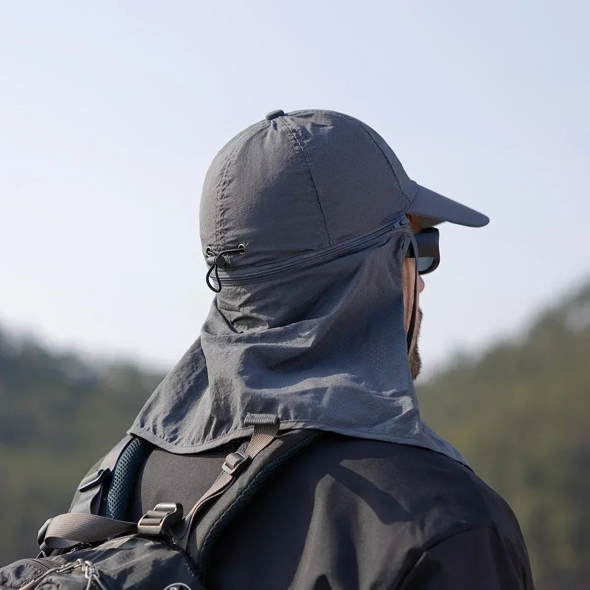 Ansoff men's summer fishing baseball cap with sun protection, quick-drying waterproof design, and detachable shawl for outdoor activities.