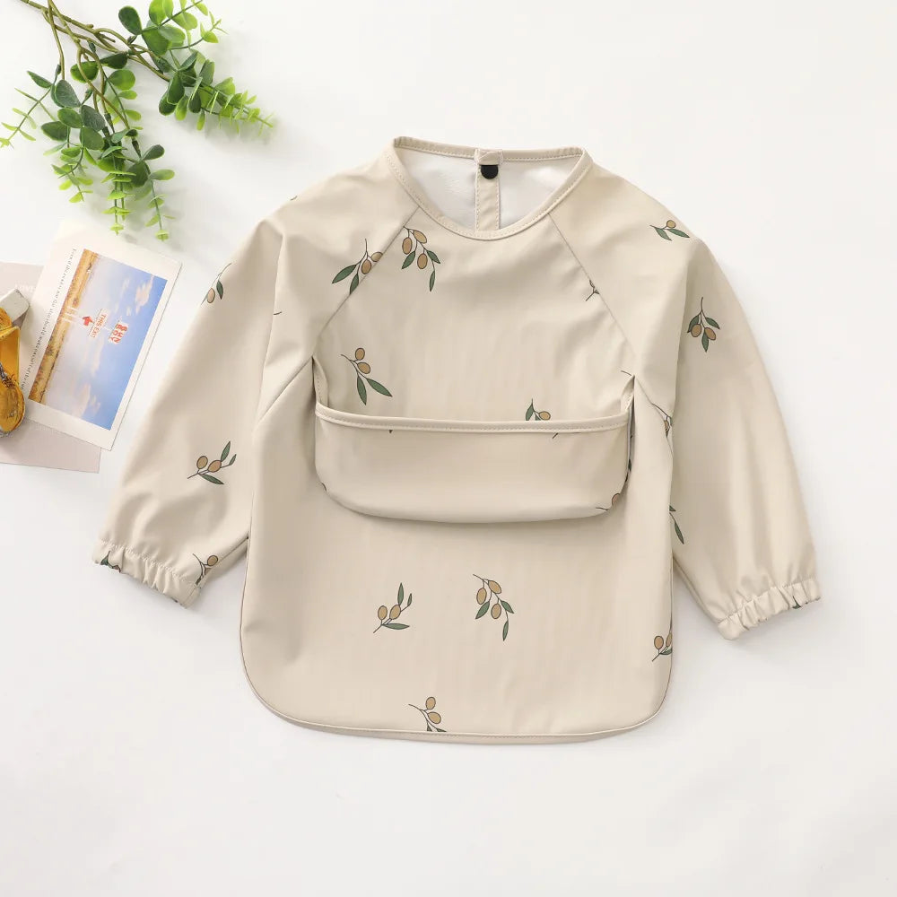 Ansoff infant feeding bibs with long sleeves, printed art design, waterproof, with pocket, for boys and girls during mealtime.