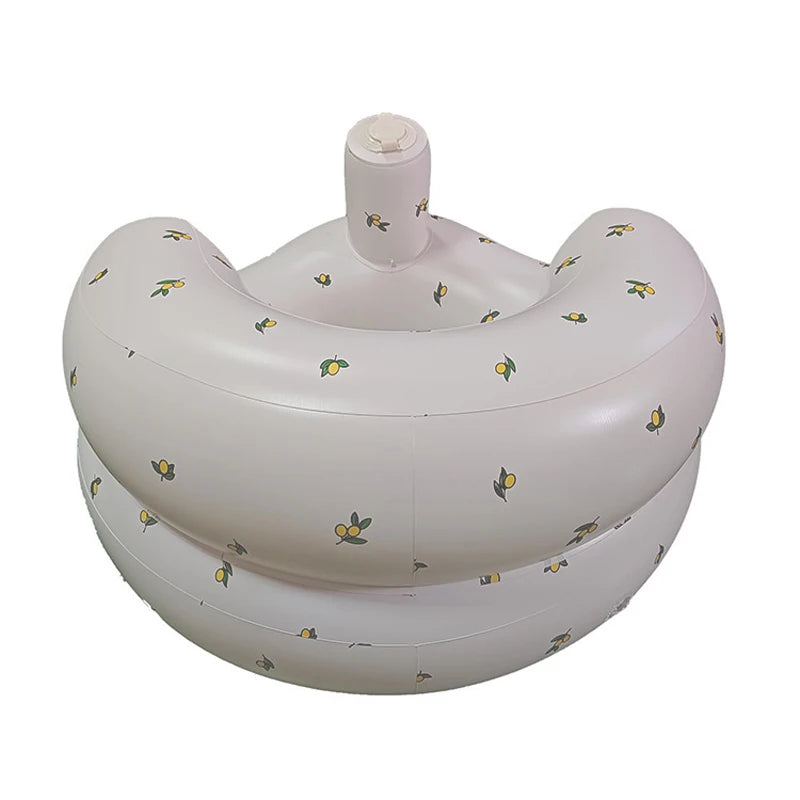 Inflatable baby sofa by Ansoff for infants 3 months and up, featuring built-in air pump and soft, cushioned seat for comfort.