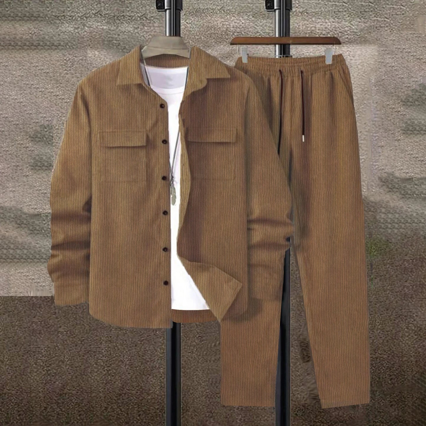Men's solid color corduroy suit by Ansoff, includes long sleeve shirt and casual pants, displayed on a hanger.