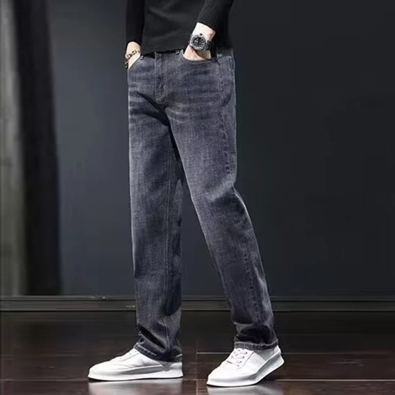 Men's dark gray elastic slim fit denim jeans by Ansoff, casual straight-leg style with wear-resistant fabric and modern design.