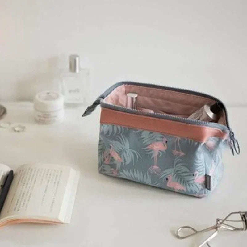 Animal-themed makeup bag by Ansoff with multiple compartments, travel toiletry organizer, and cosmetic storage for women and girls.