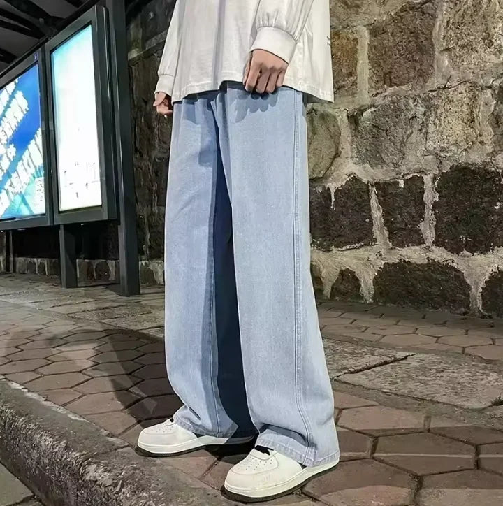 Men's loose streetwear jeans by Ansoff, in black and light blue, featuring straight wide-leg fit and Korean style fashion.