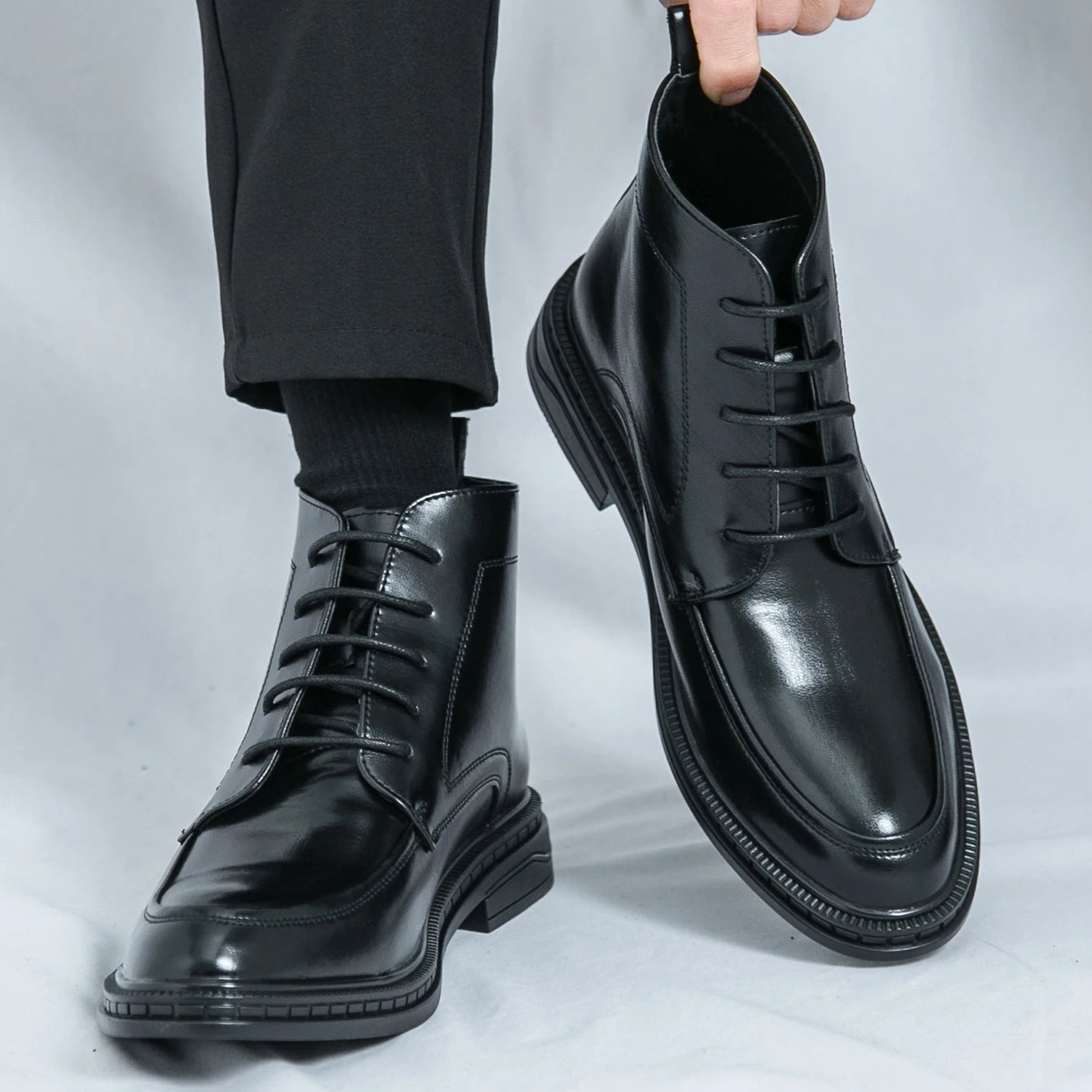 Ansoff men's leather Oxford boots with pointed toes, ankle height, and sleek design, ideal for business and formal wear