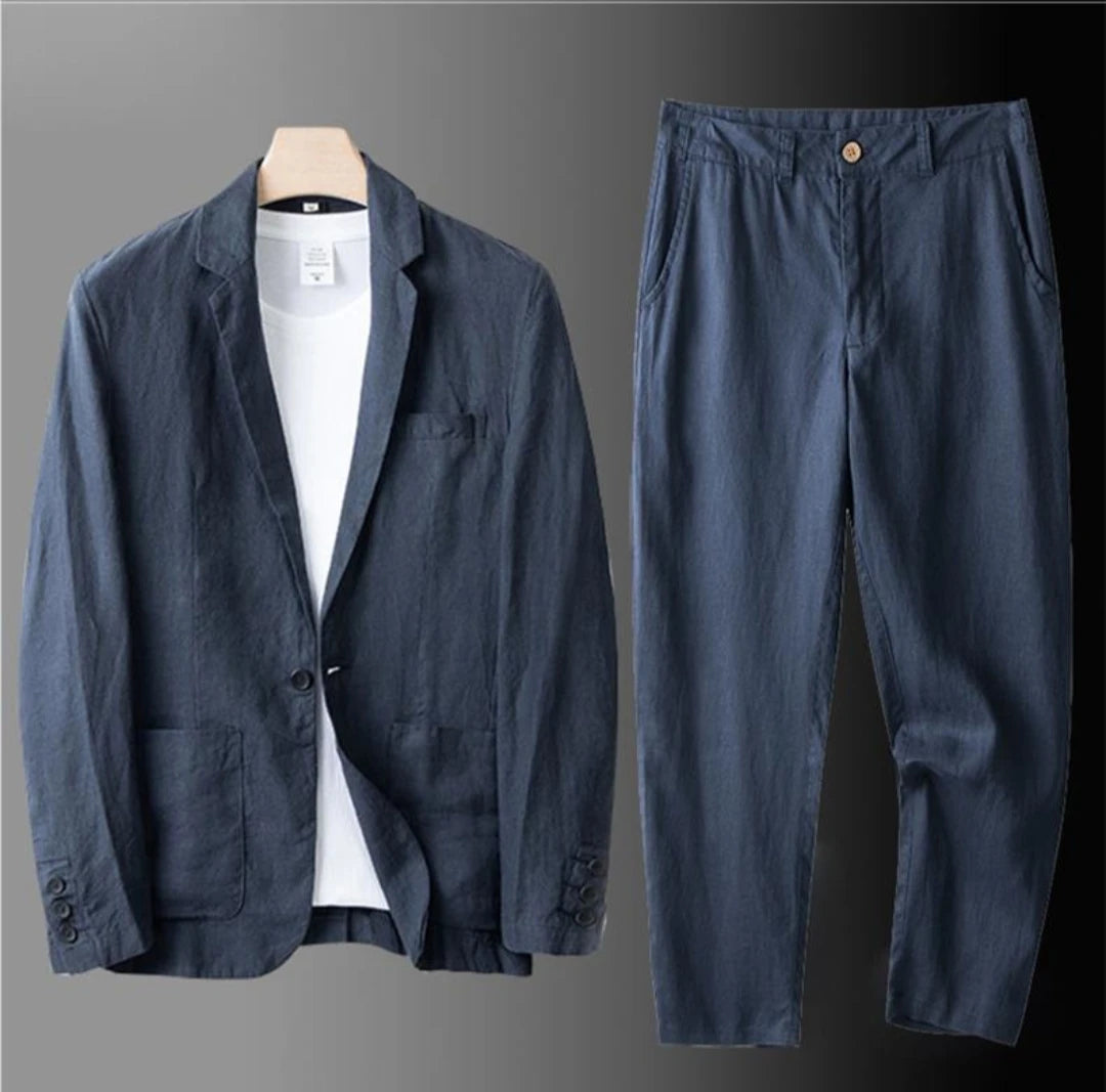 Men's summer office suit by Ansoff, featuring an airy slim fit blazer and comfortable dress pants in a stylish 2-piece set.