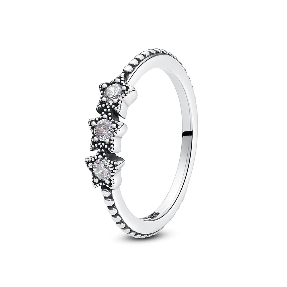 Sterling silver women's ring with crown, love heart, and wishbone design featuring rose gold accents and crystal details.