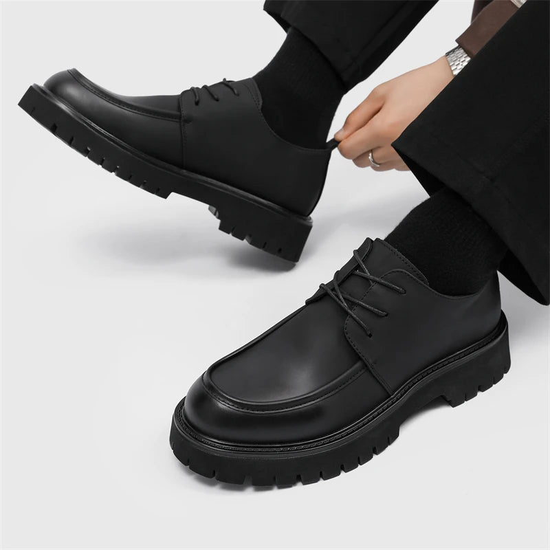 Men's black casual dress shoes by Ansoff with large toe, thick platform sole, patent leather finish, suitable for outdoor and business wear.