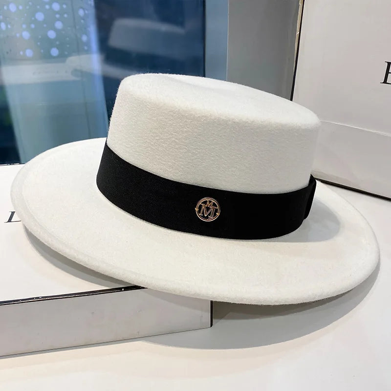 Elegant women's fedora hat by Ansoff featuring a ribbon band, suitable for weddings and fashion occasions.