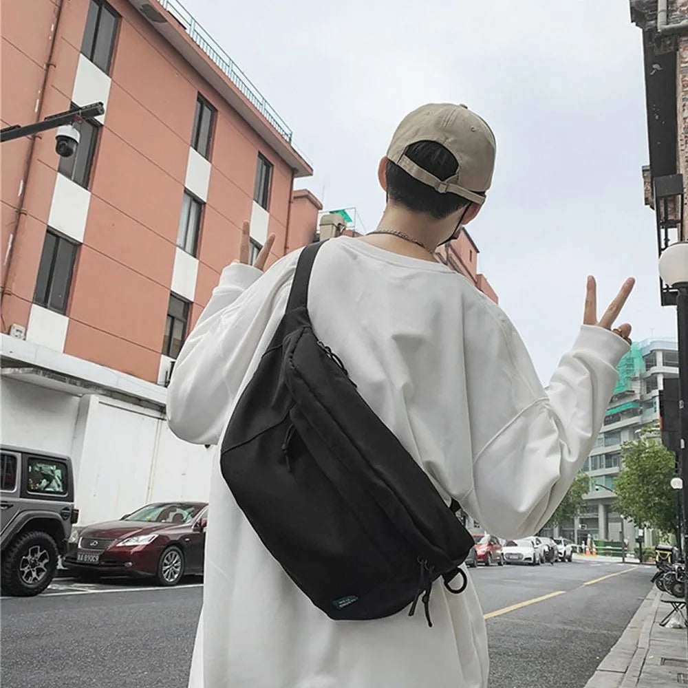 Ansoff large capacity nylon crossbody handbag with belt pouch, casual solid color travel hip bag for students and couples.