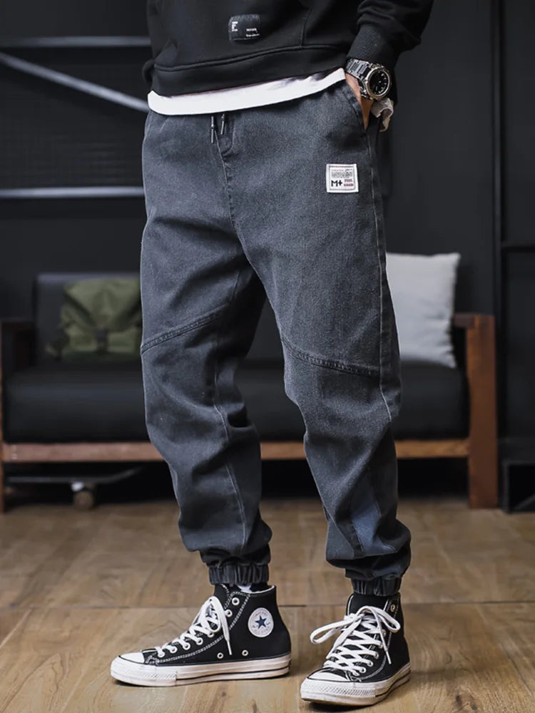 Plus size men's loose jogger jeans by Ansoff, streetwear harem style cargo denim trousers, ankle-length and comfortable.