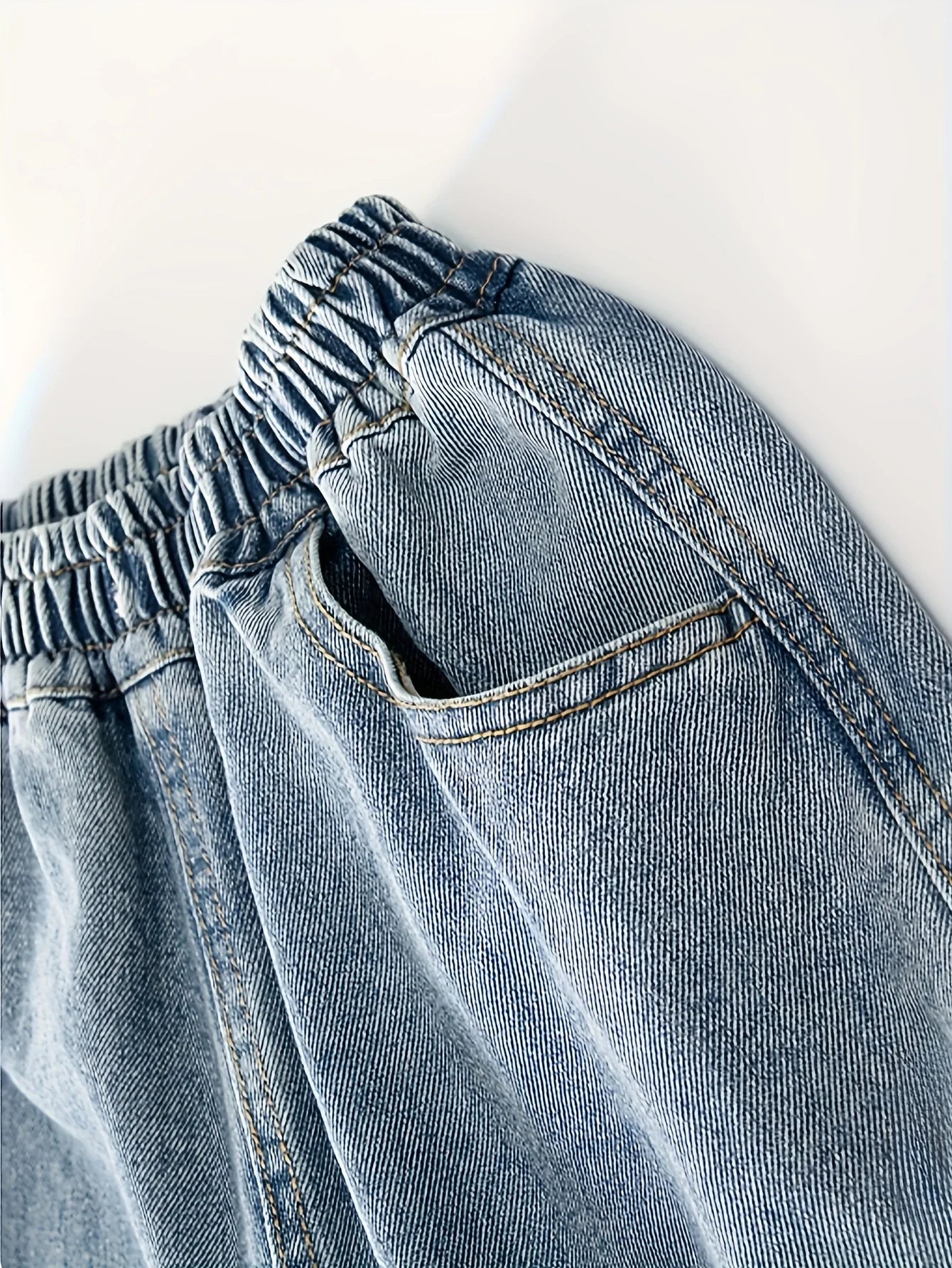 Boy's large-sized casual street jeans by Ansoff, stylish four-season straight-leg workwear denim with a handsome fit.