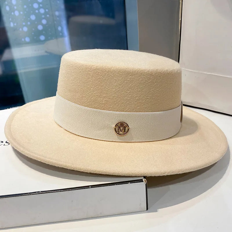 Elegant women's fedora hat by Ansoff with a ribbon band, suitable for weddings and fashion, featuring a stylish felt design.