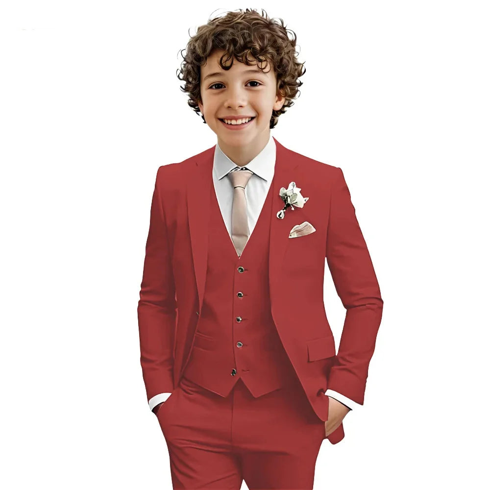 Multi-color boys' formal suit set by Ansoff with a notched lapel, slim fit tuxedo for wedding and party occasions in sizes 2-20T.
