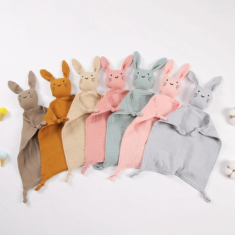 Soft gauze baby soothe blanket and bib set by Ansoff featuring a plush rabbit, teether, burp cloth, ideal for cuddling and comfort.