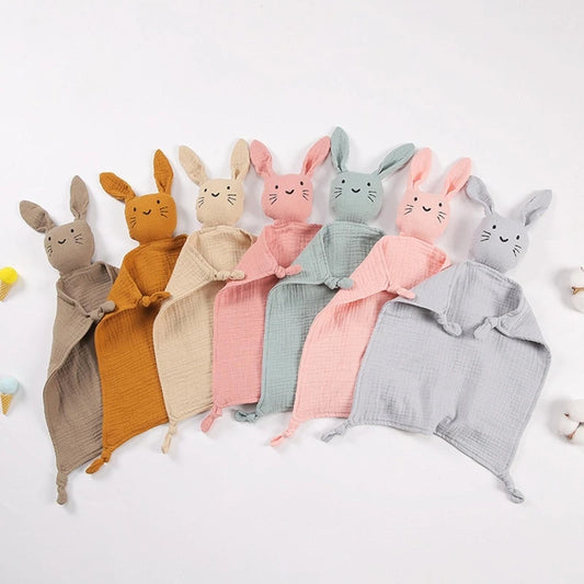 Soft gauze baby soothe blanket and bib set by Ansoff featuring a plush rabbit, teether, burp cloth, ideal for cuddling and comfort.