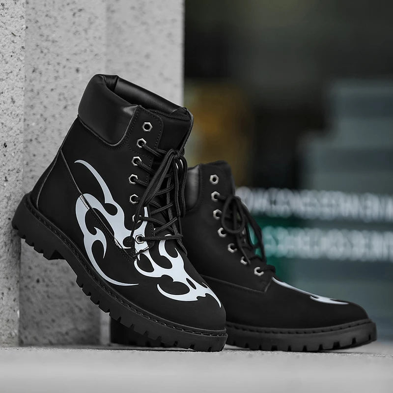 Ansoff men's British style ankle motorcycle boots in high-quality leather, unisex fashion footwear with a sleek design.