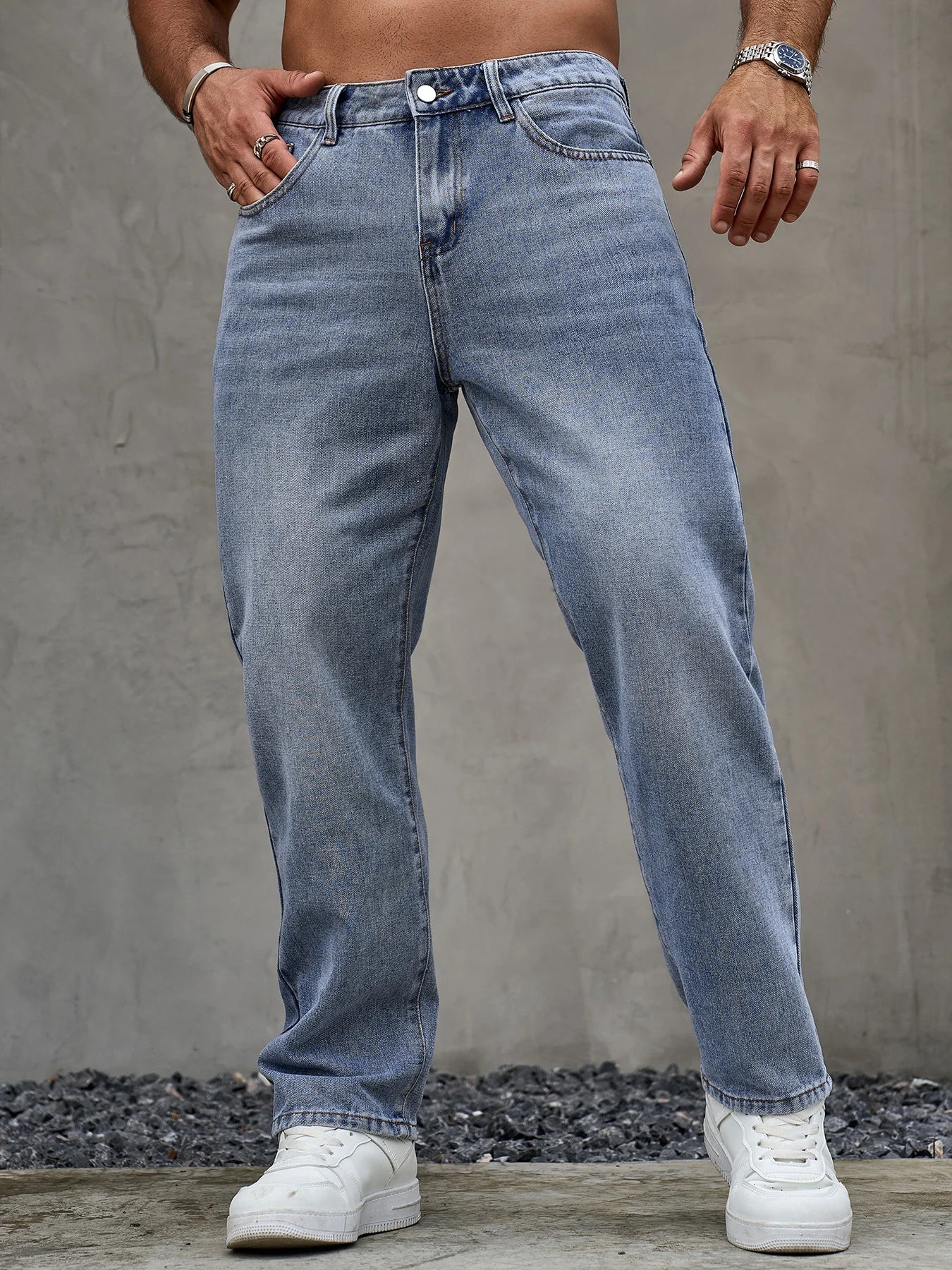 Men's blue denim jeans by Ansoff with a loose fit, straight leg style, soft durable fabric, casual versatile trousers for all seasons