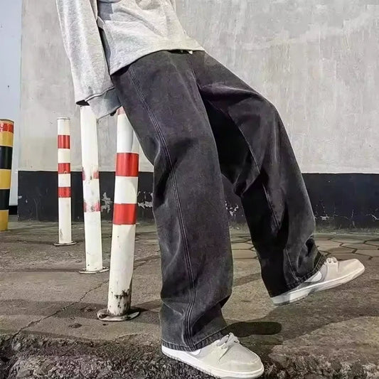 Men's loose streetwear jeans by Ansoff in black and light blue, featuring a straight wide-leg style and Korean fashion-inspired design.