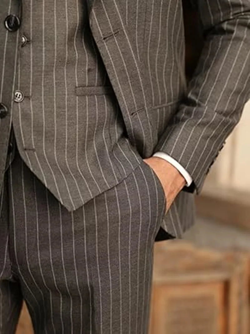 Elegant men's pinstripe 3-piece suit with blazer, vest, and pants by Ansoff, suitable for weddings and business occasions.