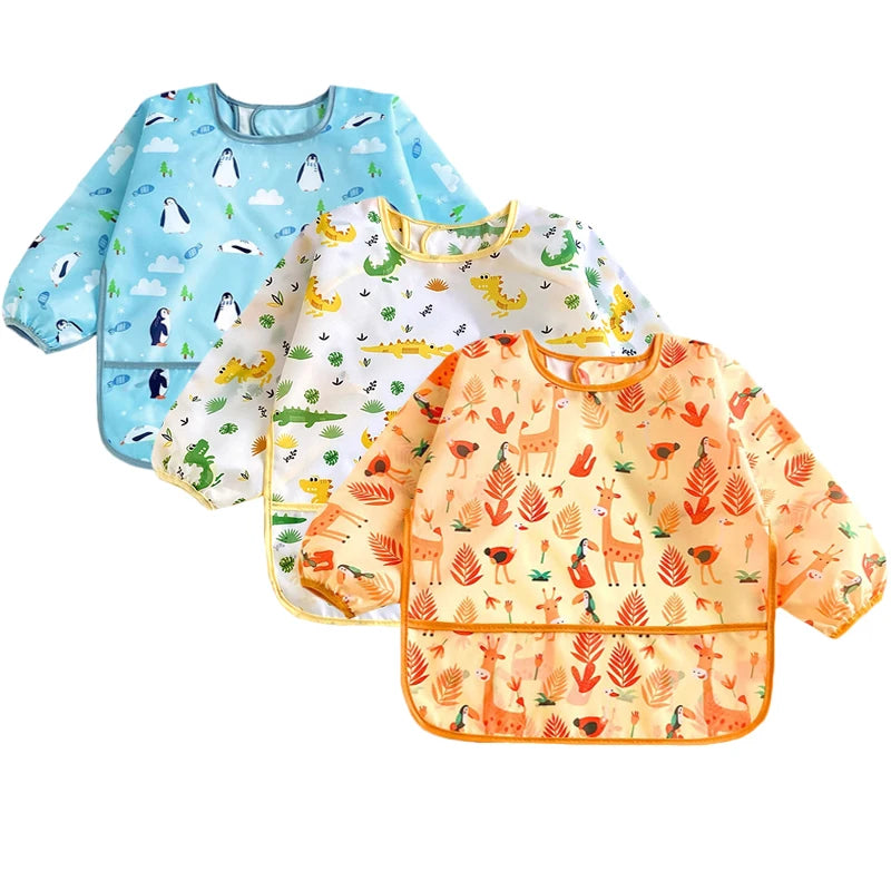Ansoff baby bib for girls and boys with cartoon design, long sleeves, waterproof fabric, adjustable feeding cloth for toddlers.