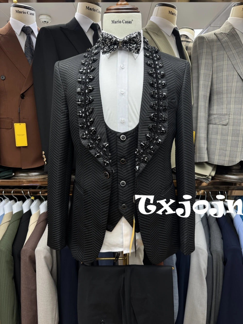 Black beaded men's suit set by Ansoff, three-piece tuxedo with sparkling details, slim fit wedding and party attire for men.
